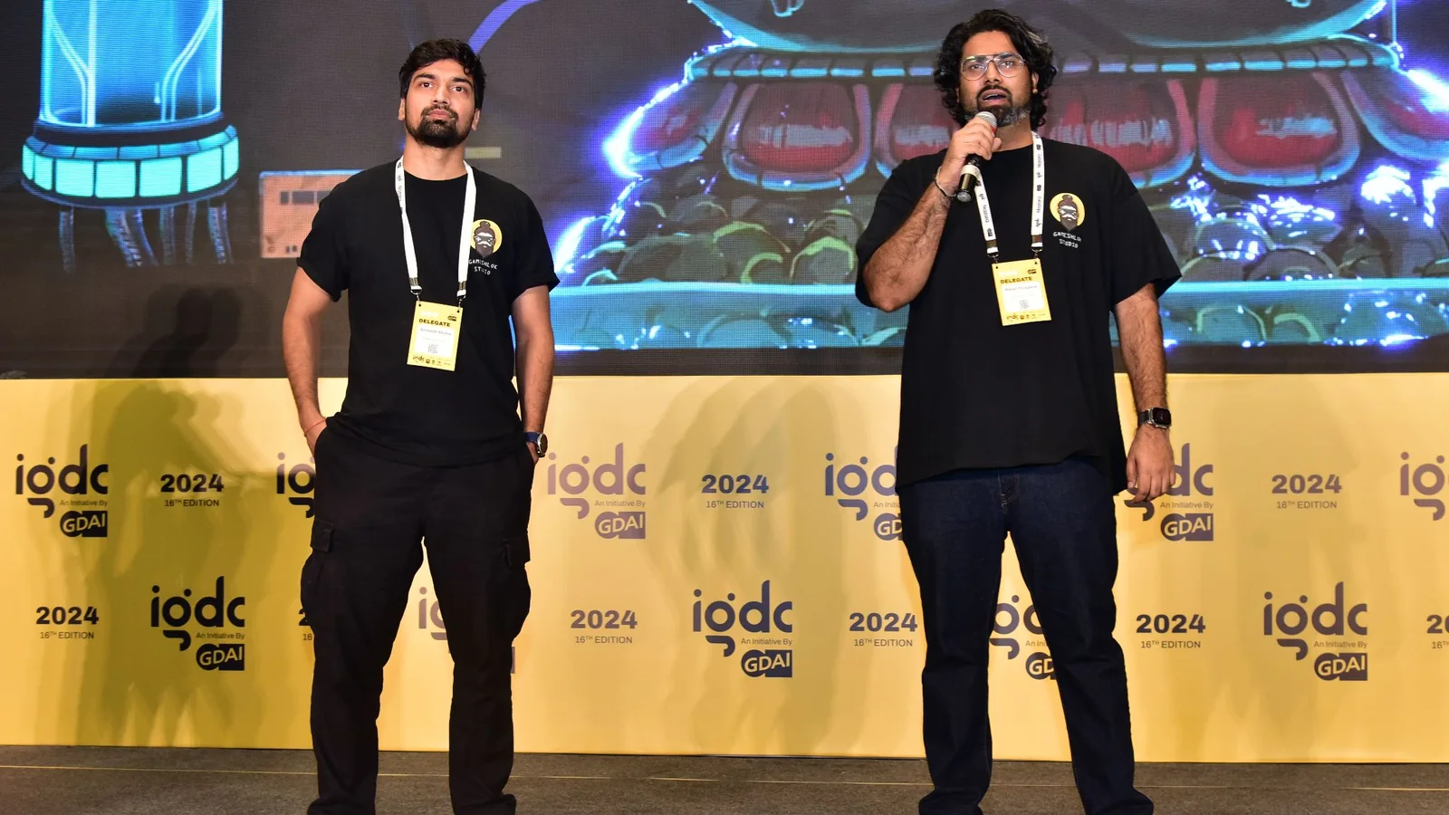 Rohan Poundarik and Aniruddh Shukla pitching Alleymental on stage at IGDC 2024 in Hyderabad